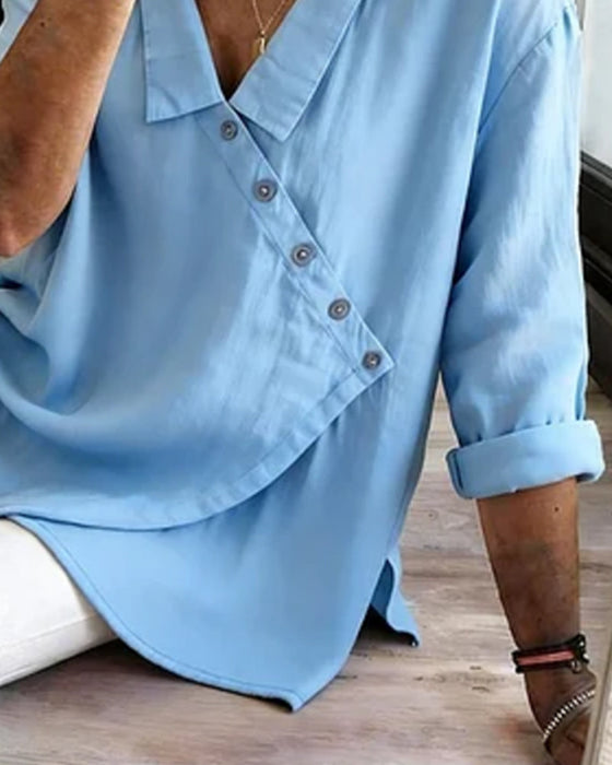 Bluse mit asymmetrischer diagonaler Knopfleiste und Kragen