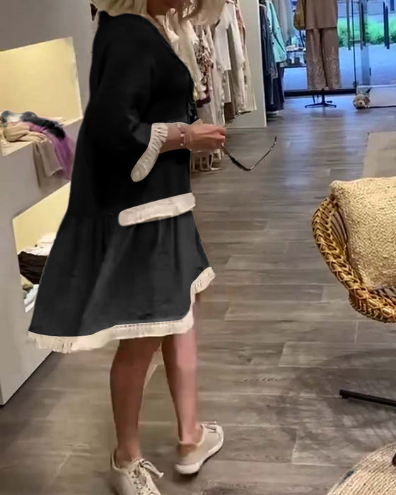 Freizeitkleid aus Spitze mit V-Ausschnitt und Fransen