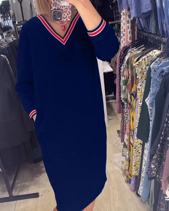 Kleid mit V-ausschnitt und taschen