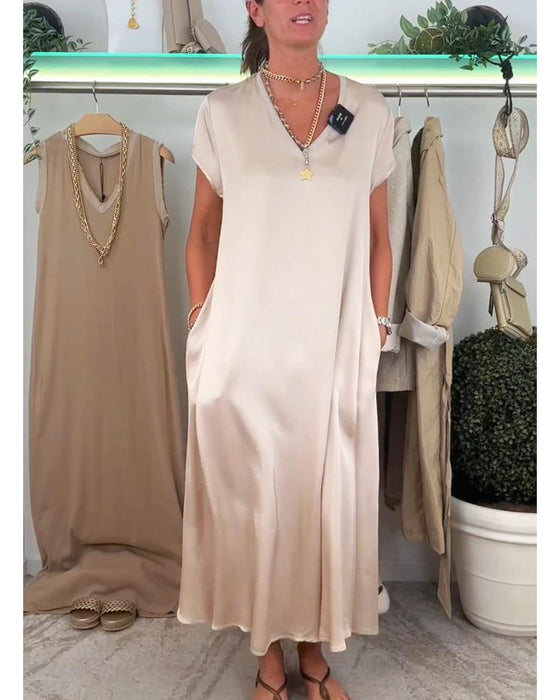 Lässiges, einfarbiges kleid mit V-ausschnitt und tasche