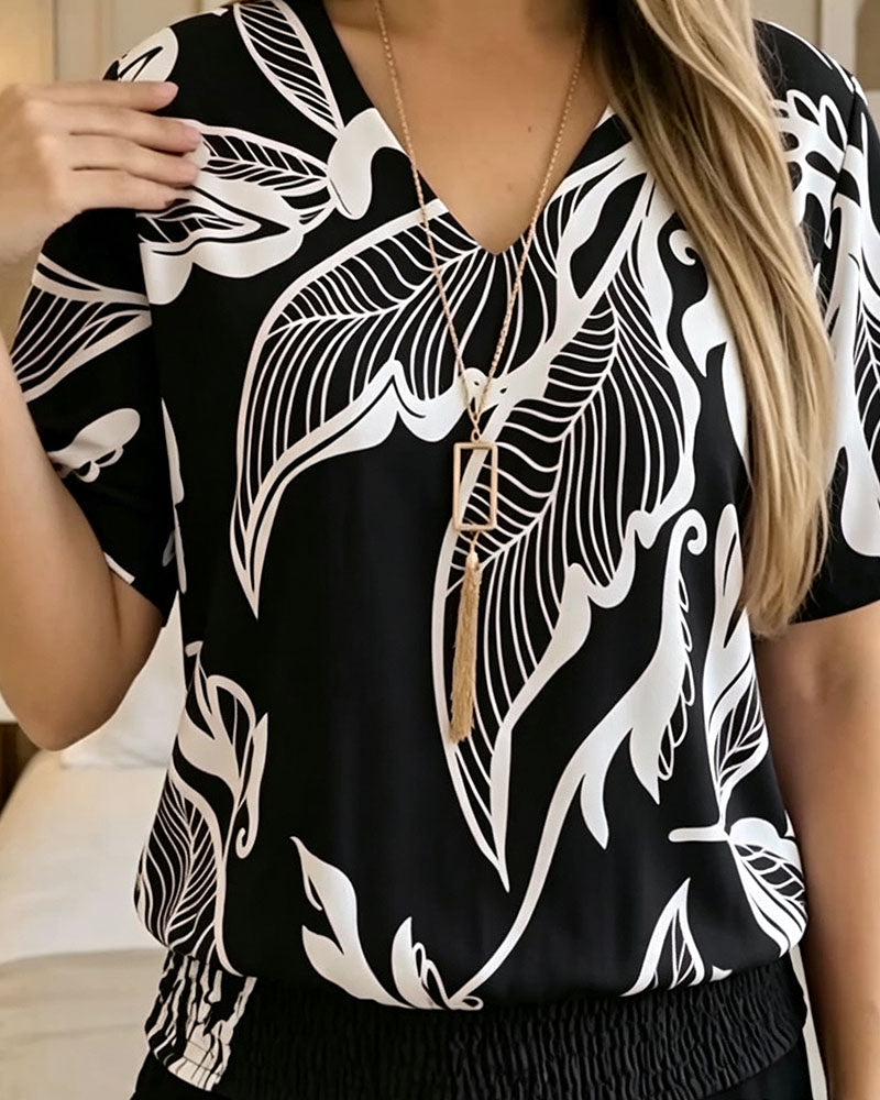 Bluse Blumenprint Gummizug Saum Kurzarm