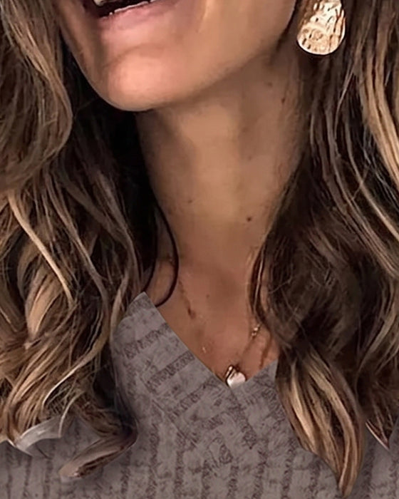 V‑Ausschnitt Langarm‑Top