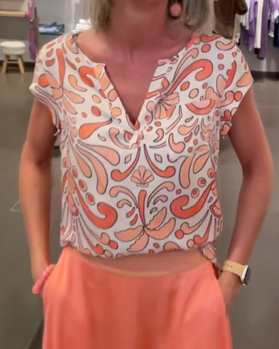 Bedruckte freizeitbluse mit v-ausschnitt und raglanärmeln