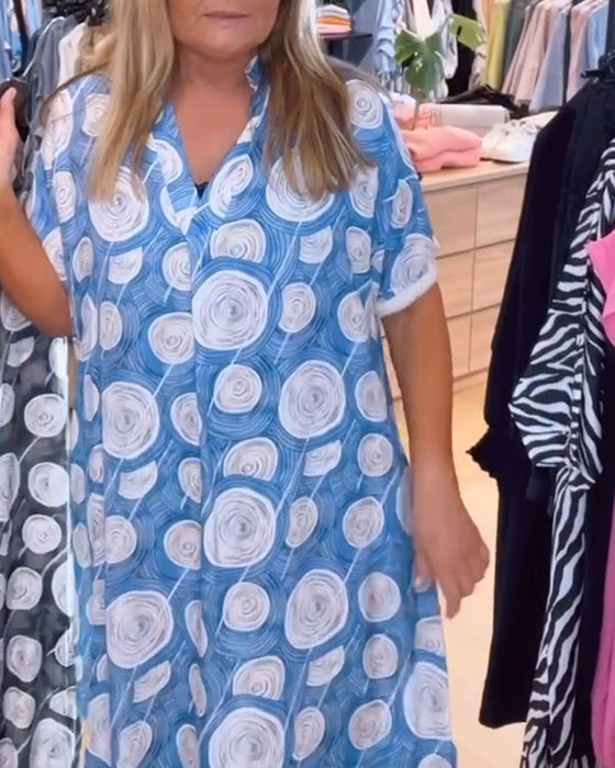 Kleid mit V-Ausschnitt und Kreismuster