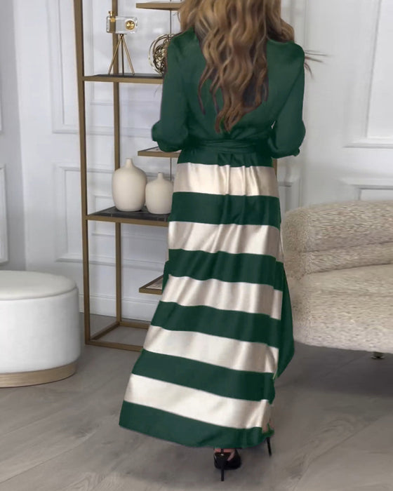 Elegantes kleid mit streifenmuster und reversriemen