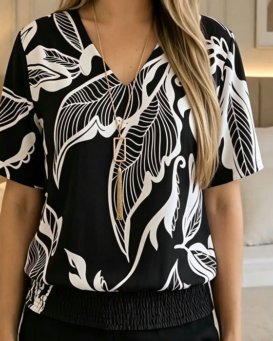 Bluse Blumenprint Gummizug Saum Kurzarm