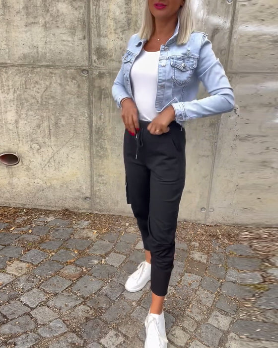 Einfarbige freizeithose mit kordelzugtaschen