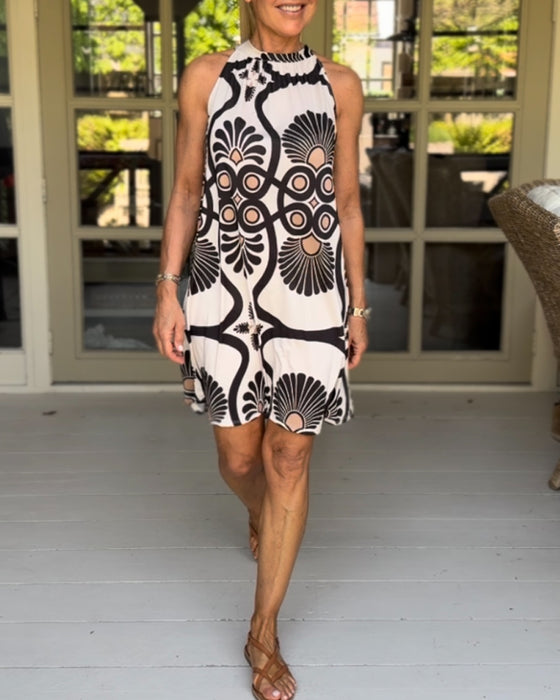 Neckholder-kleid mit vintage-print