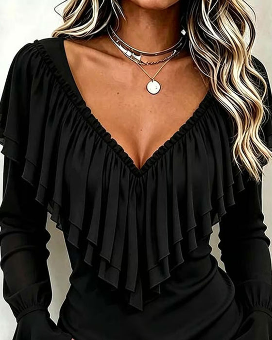 Bluse Mit Rüschen Und Glockenärmeln