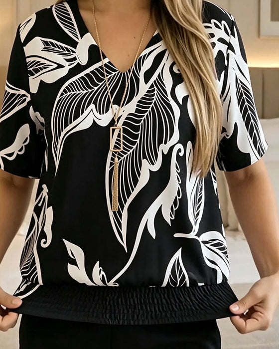 Bluse Blumenprint Gummizug Saum Kurzarm