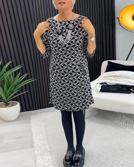 Retro-Kleid mit Rundhalsausschnitt und Tasche und geometrischem Print
