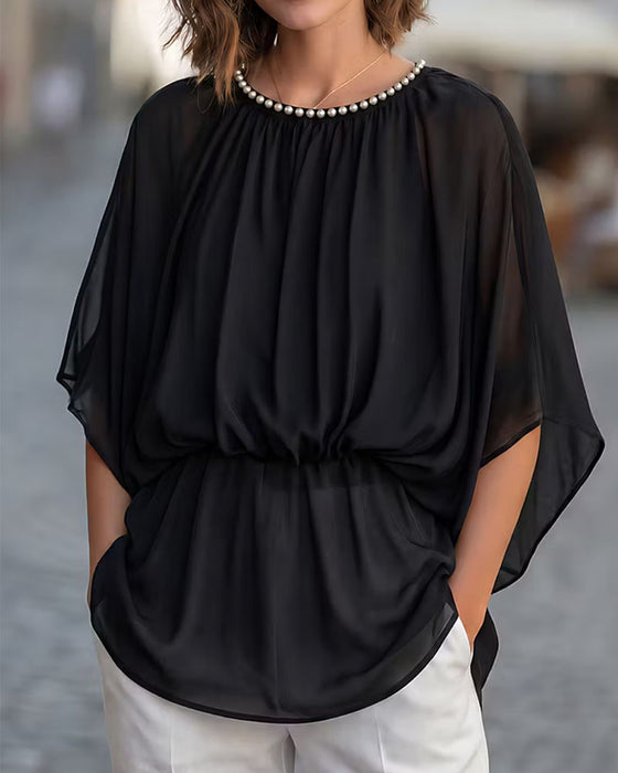 Einfarbige Bluse Mit Fledermausärmeln Und Taillierter Taille
