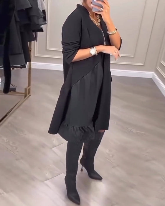 Kleid mit künstlerischem Flair und V-Ausschnitt