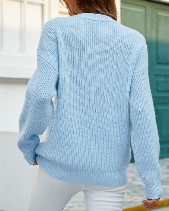 Einfarbiger Pullover mit Rundhalsausschnitt und Knöpfen
