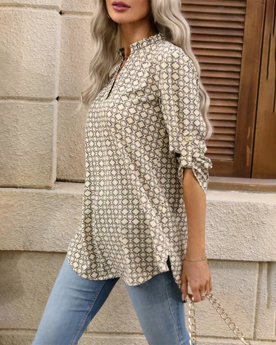 Bluse mit geometrischem Print und V-Ausschnitt