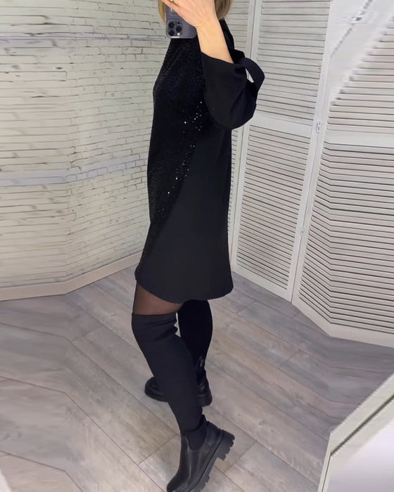 Kleid mit Pailletten und gerüschten Ärmeln
