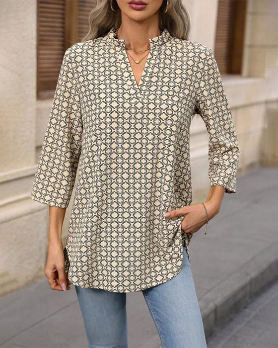 Bluse mit geometrischem Print und V-Ausschnitt