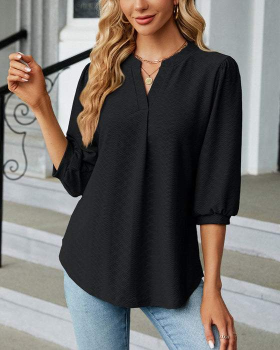 Einfarbige Jacquard-Bluse mit V-Ausschnitt