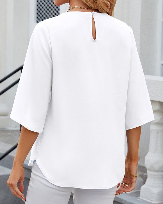 Elegante Bluse in einfarbiger Optik mit halben Ärmeln