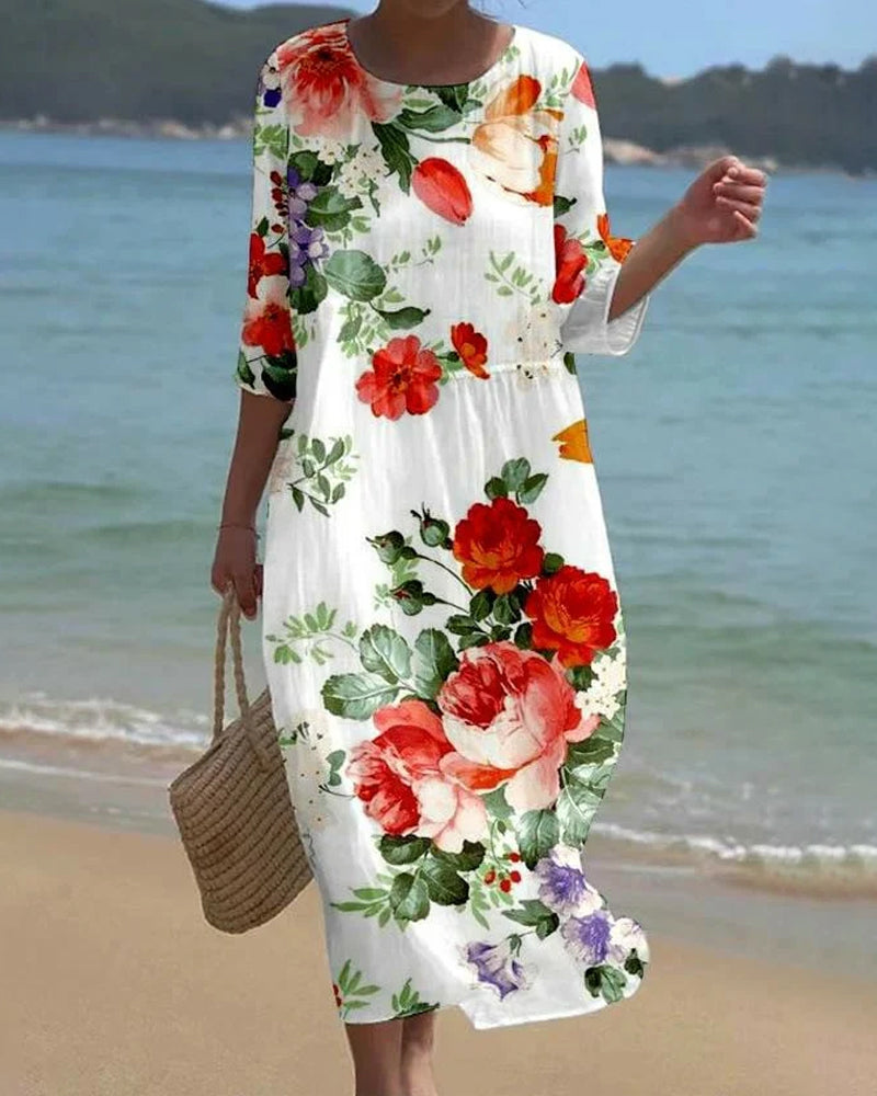 Elegantes Kleid mit Blumendruck und Rundhalsausschnitt