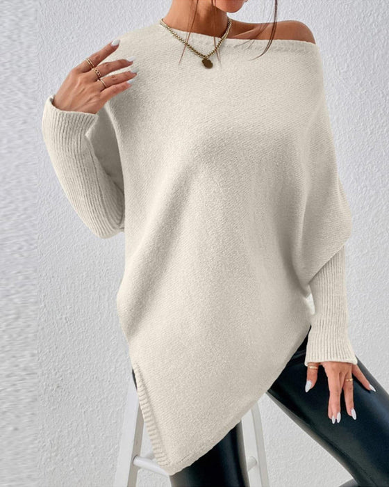 Unifarbener Pullover mit unregelmäßigem Saum