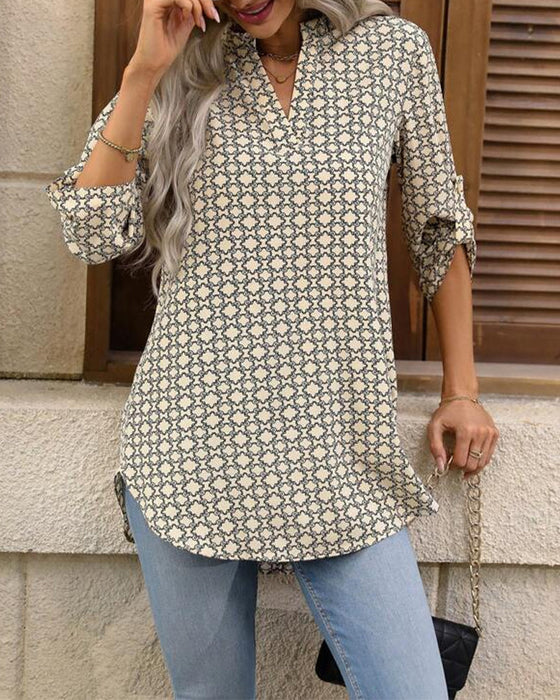 Bluse mit geometrischem Print und V-Ausschnitt