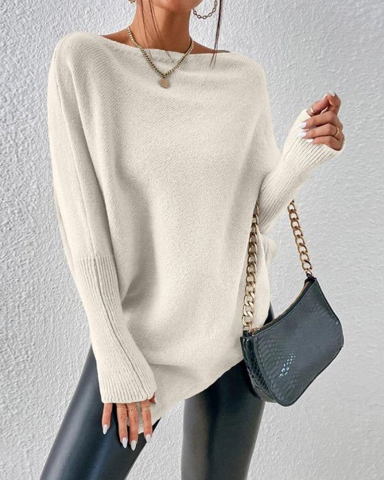 Unifarbener Pullover mit unregelmäßigem Saum