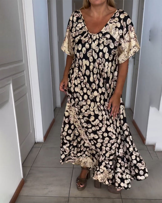 Bedrucktes Kurzarmkleid mit V-Ausschnitt