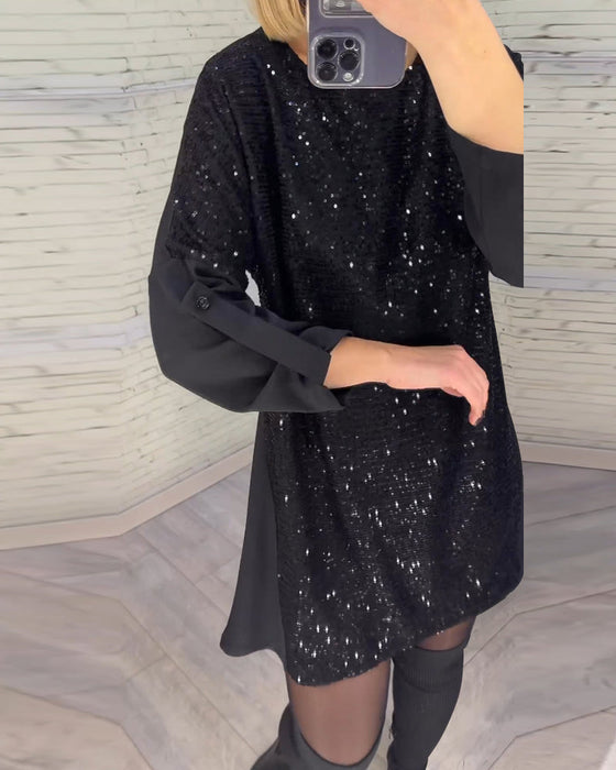Kleid mit Pailletten und gerüschten Ärmeln