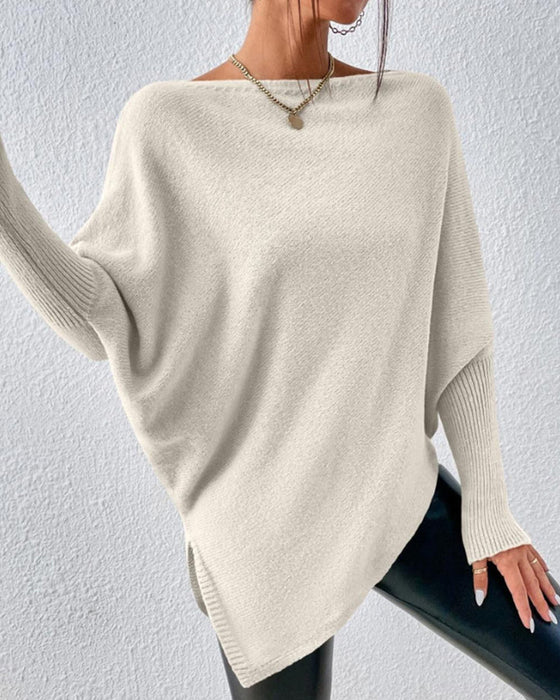 Unifarbener Pullover mit unregelmäßigem Saum