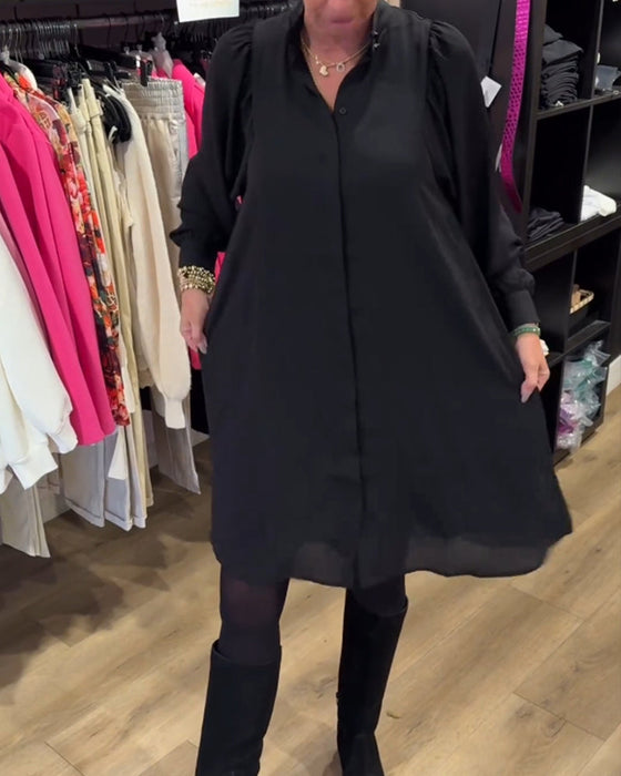 Kleid mit V-Ausschnitt und knielang