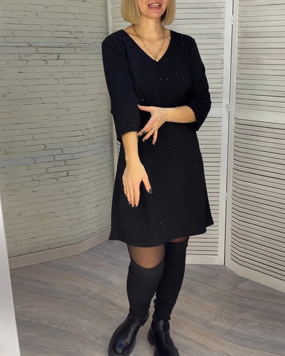 Elegantes Kleid mit V-Ausschnitt und Dreiviertelärmeln