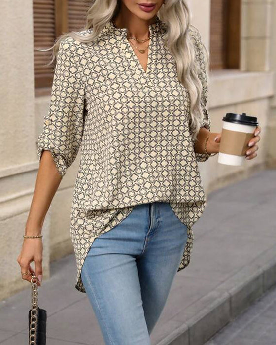 Bluse mit geometrischem Print und V-Ausschnitt