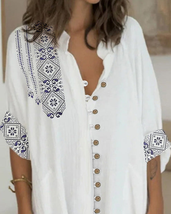 Kleid mit 3/4-Ärmeln und Knöpfen
