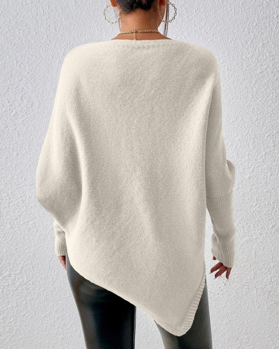 Unifarbener Pullover mit unregelmäßigem Saum
